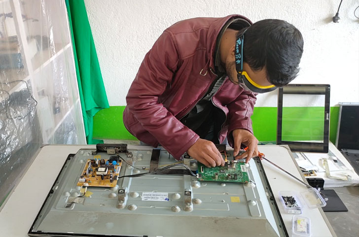 Technician repairing board